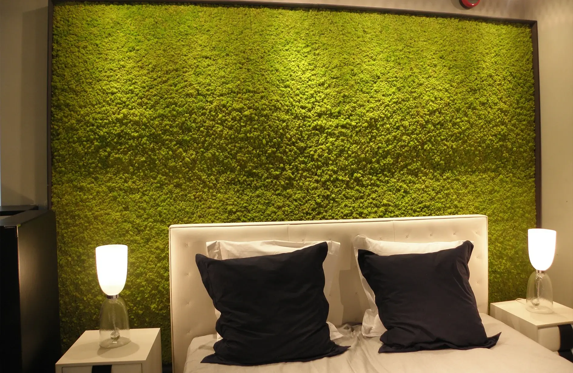 Bedroom showing the moss wall interior benefits