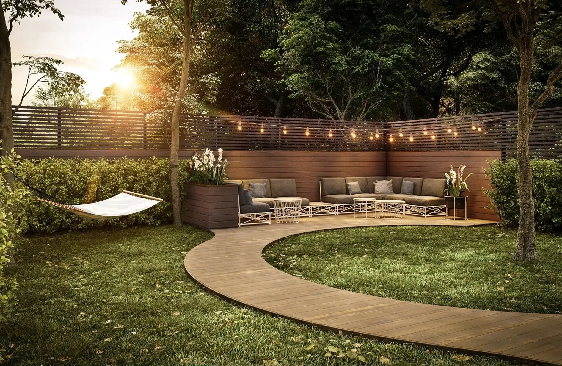 Curved wooden path, hammock, and seating area using landscaping materials Edmonton homeowners trust.
