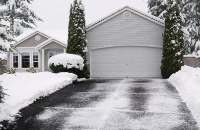 Edmonton winter driveway paving in snowy conditions
